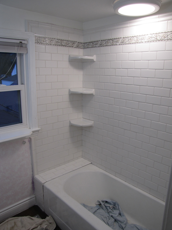 White subway tile surround